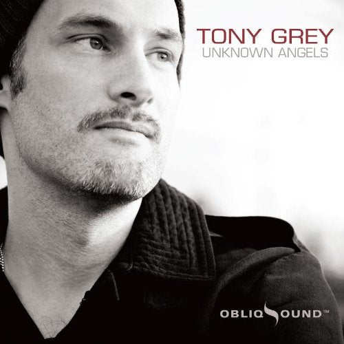 "Tony Grey's album cover featuring a black-and-white portrait of the artist."