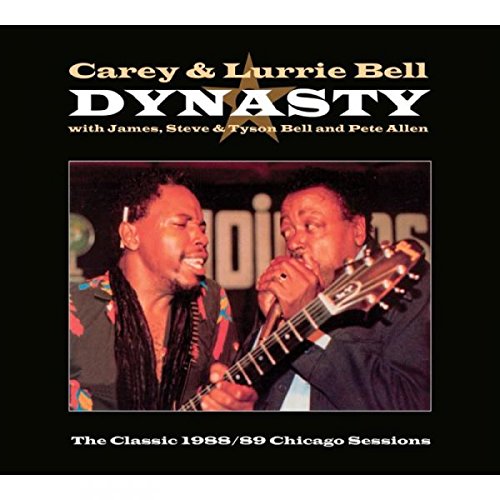 "CD cover with two men singing and playing guitar on a black background."