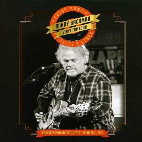 Randy Bachman playing guitar on stage, black and white photo on album cover.