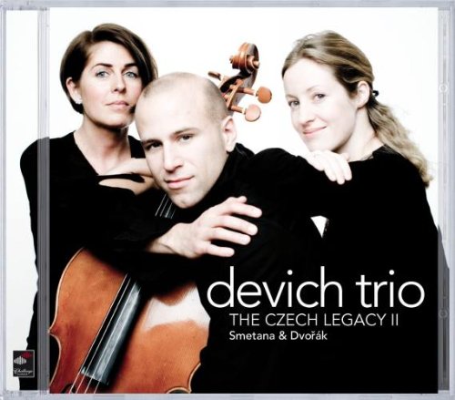 CD cover featuring three musicians in black, with a man holding a cello.
