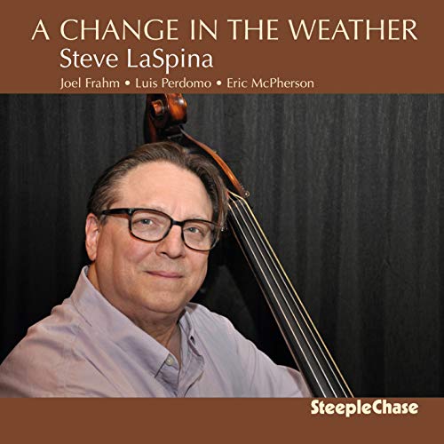 Album cover with a man holding a double bass, brown background and white text.