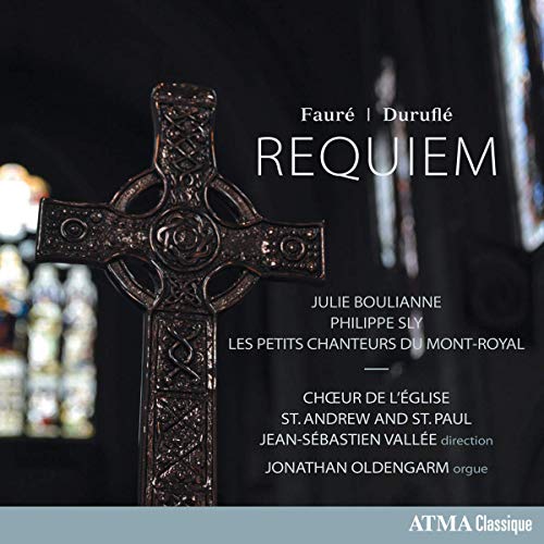 A CD cover featuring a large Celtic cross against a dark background.