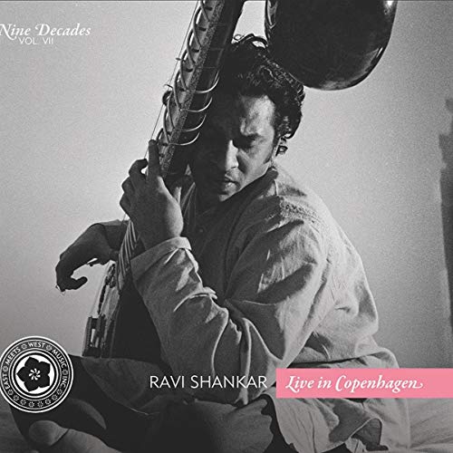 Black and white album cover featuring a man holding a sitar, with text overlays.