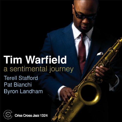 Jazz CD cover with man holding saxophone, wearing suit and tie against a black background.
