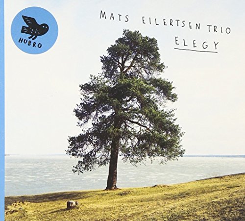 "CD cover with a tree on a hill by water, blue logo, and text."