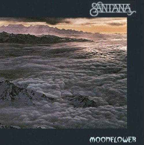 "Album cover with 'Santana' and 'Moonflower' text, featuring a mountain landscape with clouds."