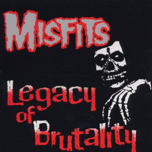 Misfits album cover: skull with skeleton hand, red and silver text.