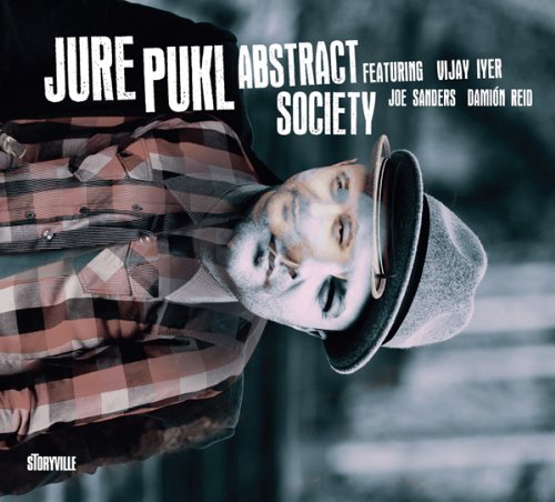 Jure Pukl's album cover: man in hat and plaid shirt, distorted facial features.