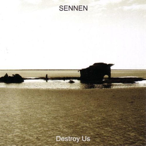 "Sennen album cover featuring a sepia-toned image of a rocky beach with a wrecked boat."