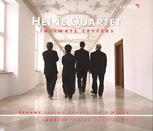 CD cover with four men in black walking down a white hallway.