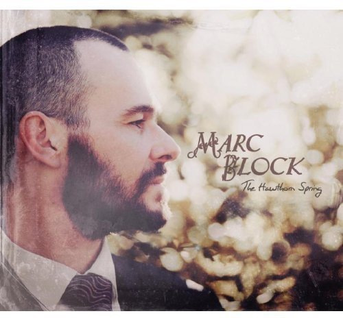 Album cover with a bearded man in a suit, flowers in the background.