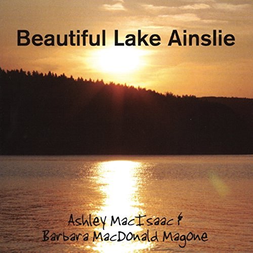 "Album cover with serene lake at sunset and artist names."
