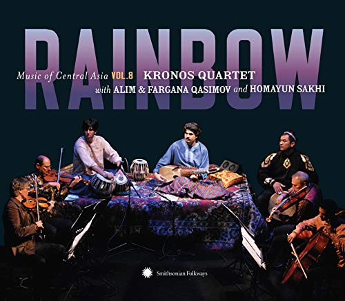 "Kronos Quartet album cover featuring musicians seated around a table with various instruments."