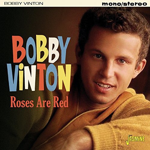 Bobby Vinton's album cover featuring his portrait and multicolored text on a dark background.