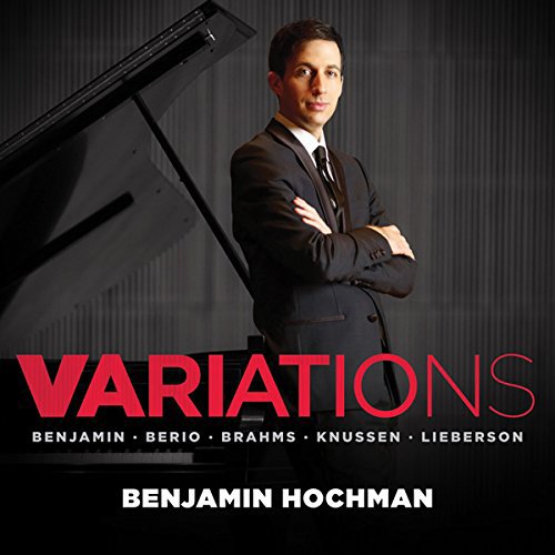 Man in suit stands beside grand piano, with "Variations" in red text on album cover.