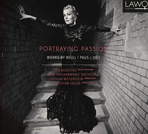 "CD cover featuring a woman in a long dress on a brick staircase."
