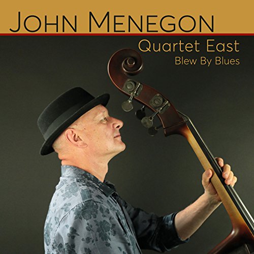 "Album cover featuring a man in a hat holding a double bass."
