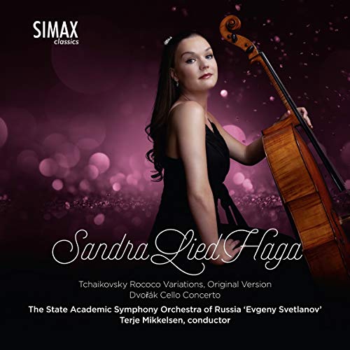 A woman in a black dress holding a cello against a purple bokeh background.
