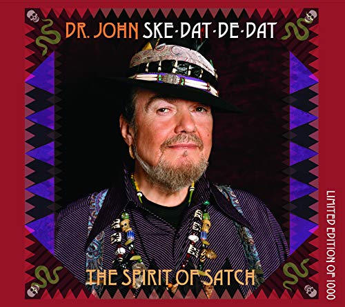 "CD cover featuring Dr. John, a man with a hat and beaded necklaces, on a red background."