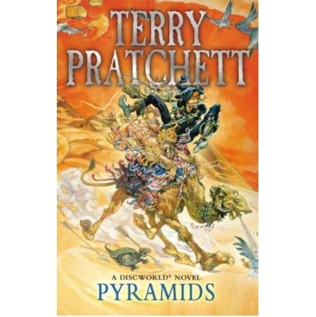 "Book cover of 'Pyramids' by Terry Pratchett, showing a camel rider in a desert."