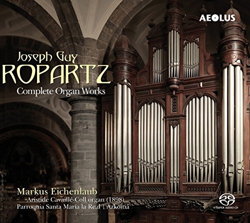"CD cover featuring a large pipe organ in a stone church."