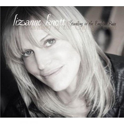 Black and white CD cover featuring a woman with shoulder-length blonde hair smiling.