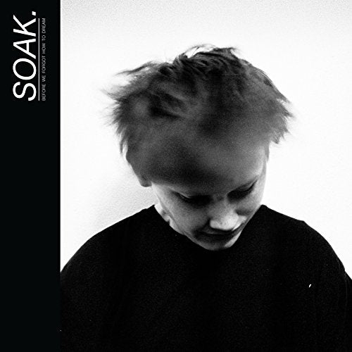 Black and white album cover with a man and text "SOAK. BEFORE WE FORGOT HOW TO DREAM".