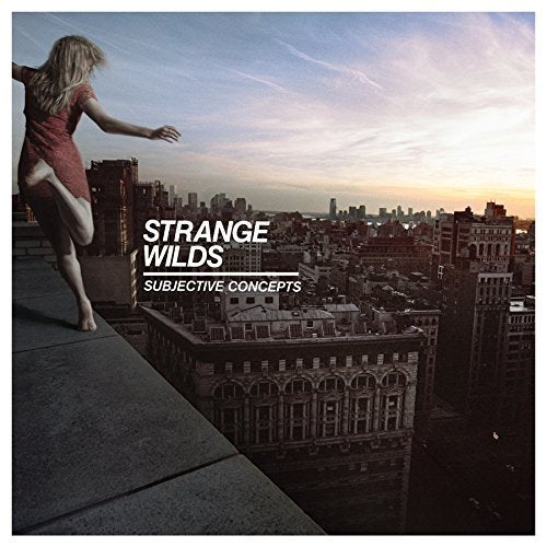 "Album cover with a woman standing on a rooftop overlooking a cityscape at dusk."