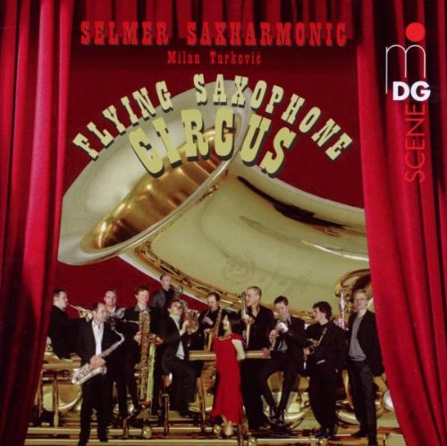 "CD cover featuring a group of musicians on stage with a large saxophone."