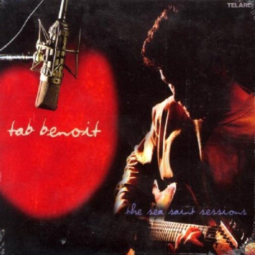"Album cover featuring a man playing guitar with a microphone above him."
