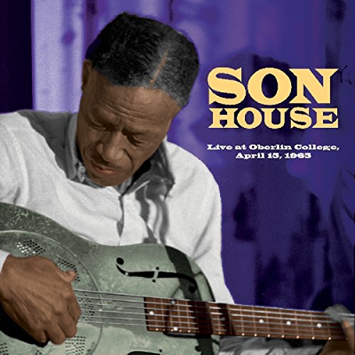"CD cover featuring Son House playing a guitar, with yellow and white text."