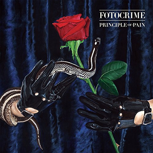 "Vinyl album cover with gloved hands holding snake and red rose against dark blue velvet."