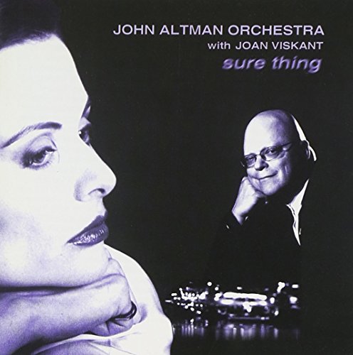 Album cover with a woman's profile and a man sitting at a piano.
