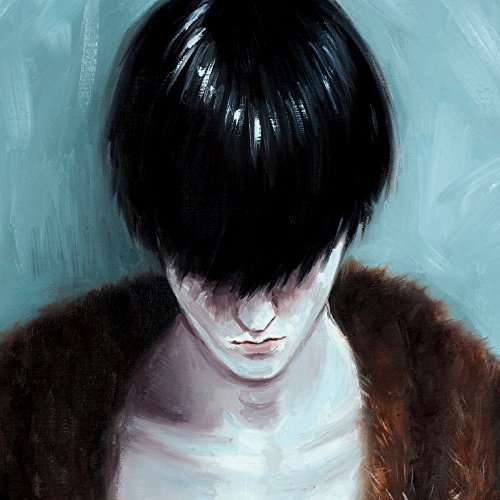 The alt text for the image is: "Album cover art featuring a man with dark hair and brown jacket."