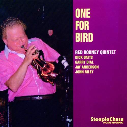 "Album cover with man playing trumpet and purple background with yellow and white text."