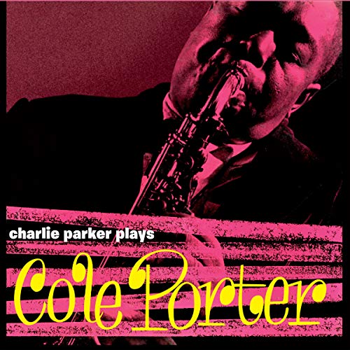Album cover with Charlie Parker playing saxophone, magenta tint, and yellow text.