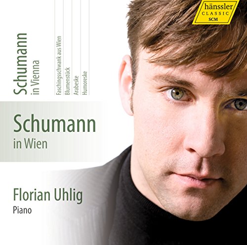 CD cover with a man's face and green text on a white background.