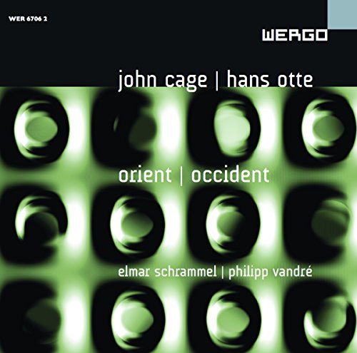 "CD cover with green and black abstract design, featuring artist names in white text."