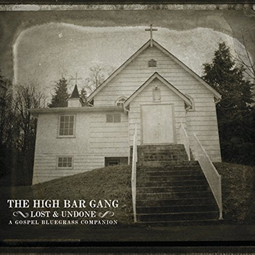 "CD cover featuring a sepia-toned image of a church with stairs and cross."