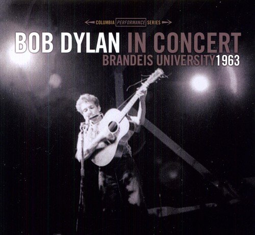 Black and white vinyl album cover featuring Bob Dylan performing on stage with a guitar.