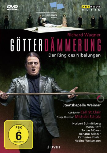 DVD cover of "Gotterdammerung" featuring a man holding a spear, with opera scene above.