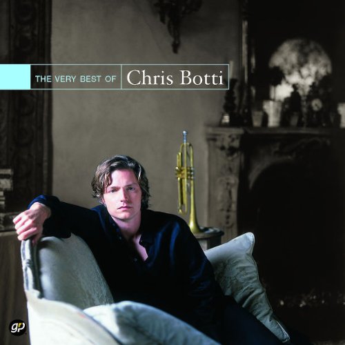 Chris Botti album cover with man lounging on a sofa, trumpet in the background.