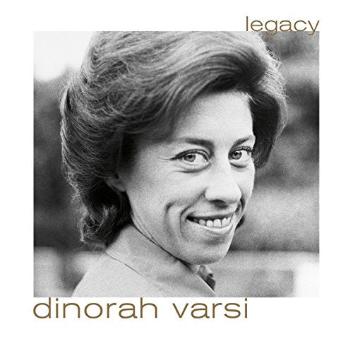 Black and white portrait of a smiling woman on a white album cover.