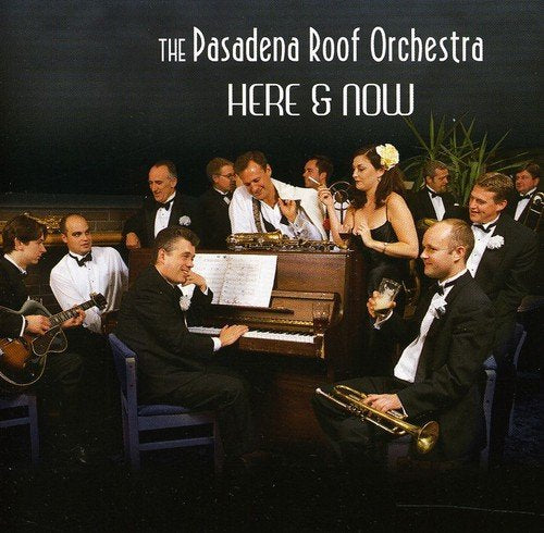 "Album cover featuring a formally dressed band performing with various musical instruments."