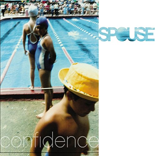 Album cover with two female swimmers and a man wearing a yellow hat.