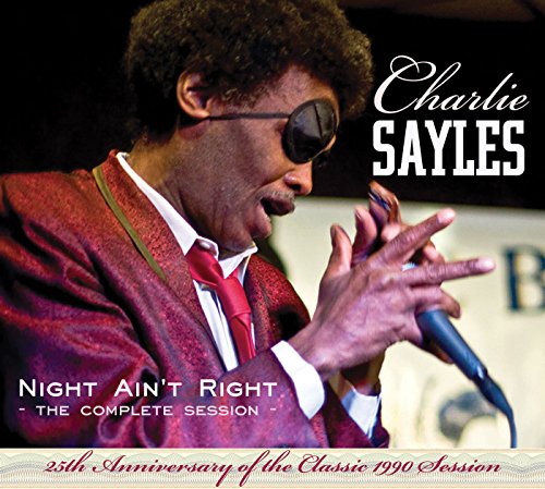 "Album cover featuring Charlie Sayles singing into a microphone, wearing a red suit."
