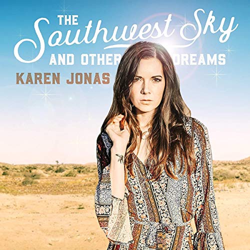 Album cover: woman in patterned dress standing in desert, blue sky behind her.