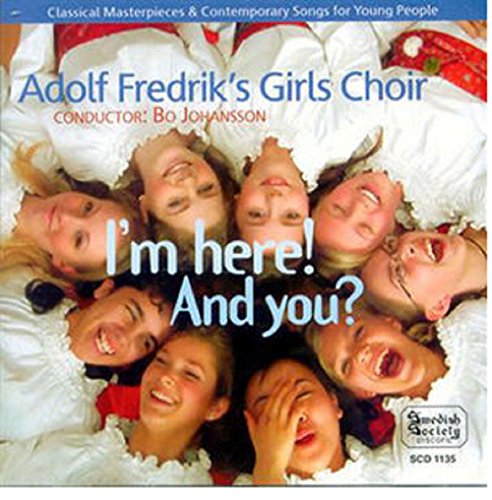"CD cover featuring a group of smiling girls in white and red outfits."