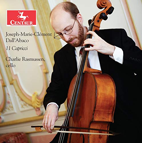 Man in a black suit plays a cello, with red logo and text overlay.