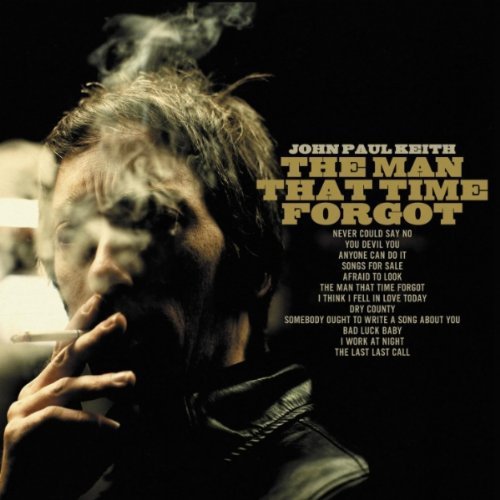 "Album cover with a man smoking, title 'The Man That Time Forgot' in gold."